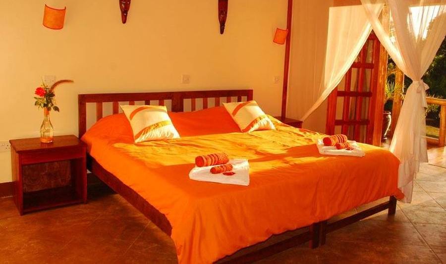 Mango Schlafzimmer, Karibu Guesthouse, Entebbe, Uganda Rundreise