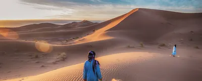 Privatreise Marokko, Nomaden mit ihrem Kamel, Sahara Wüste, Marokko Reise